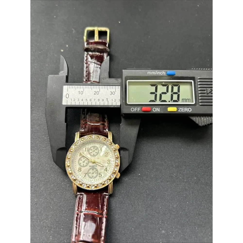 Gold Tone Pearlized Dial Women’s Quartz Watch